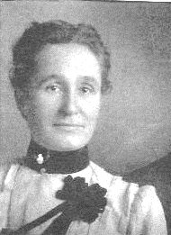 A person in a black and white photo

Description automatically generated